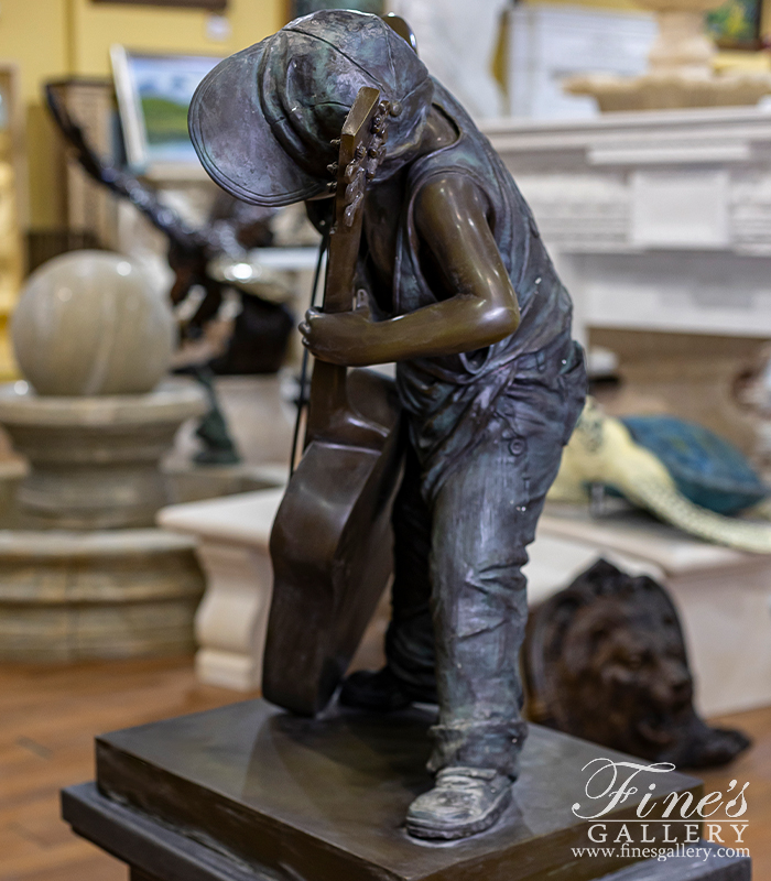 Bronze Statues  - Young Boy Playing Guitar Like A Cello - BS-323
