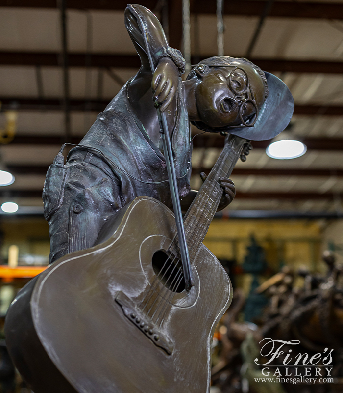 Bronze Statues  - Young Boy Playing Guitar Like A Cello - BS-323