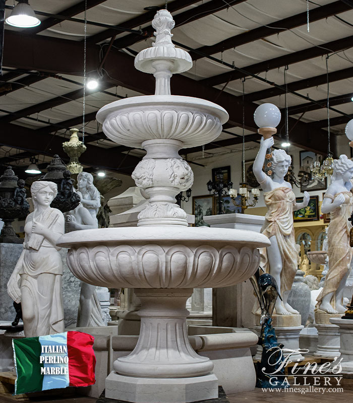 A Tiered Lion Head Themed Fountain in Italian Bianco Perlino Marble
