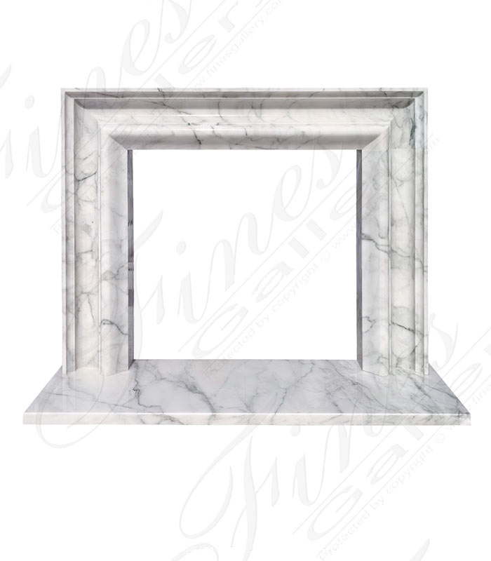 A Bolection Style Mantel in Calacatta Marble