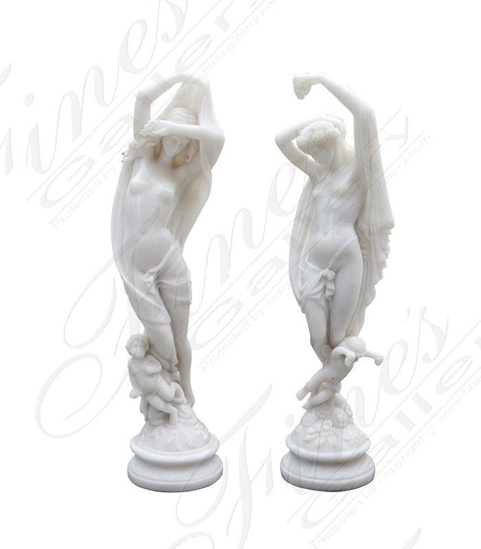 A stunning pair of antique reproduction statues
