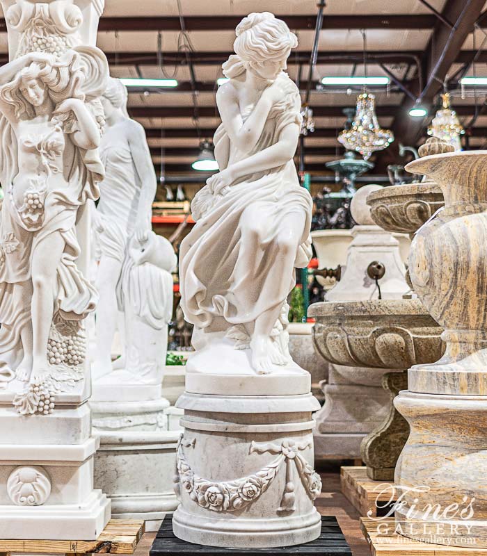 Marble Enchantress on an Ornate Pedestal