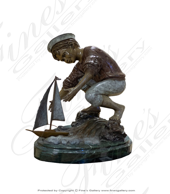 Boy Playing with Sailboat Bronze Statue