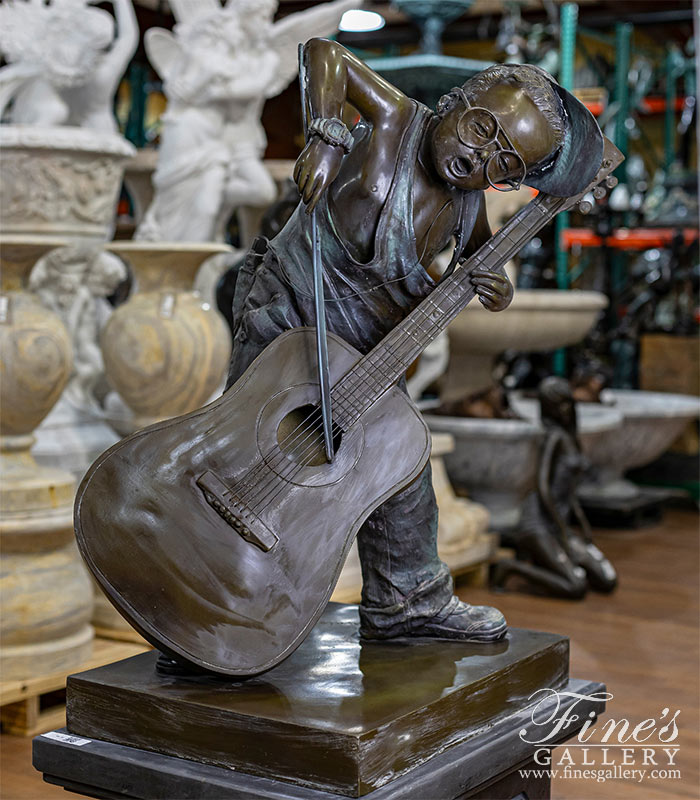 Bronze Statues  - Young Boy Playing Guitar Like A Cello - BS-323