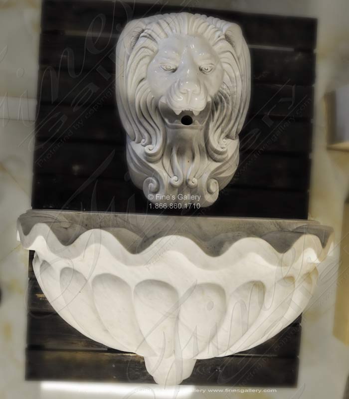 A carved Lion Head Fountain