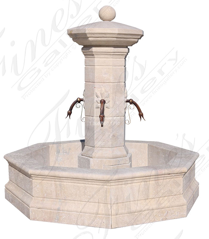 A stunning travertine limestone post fountain