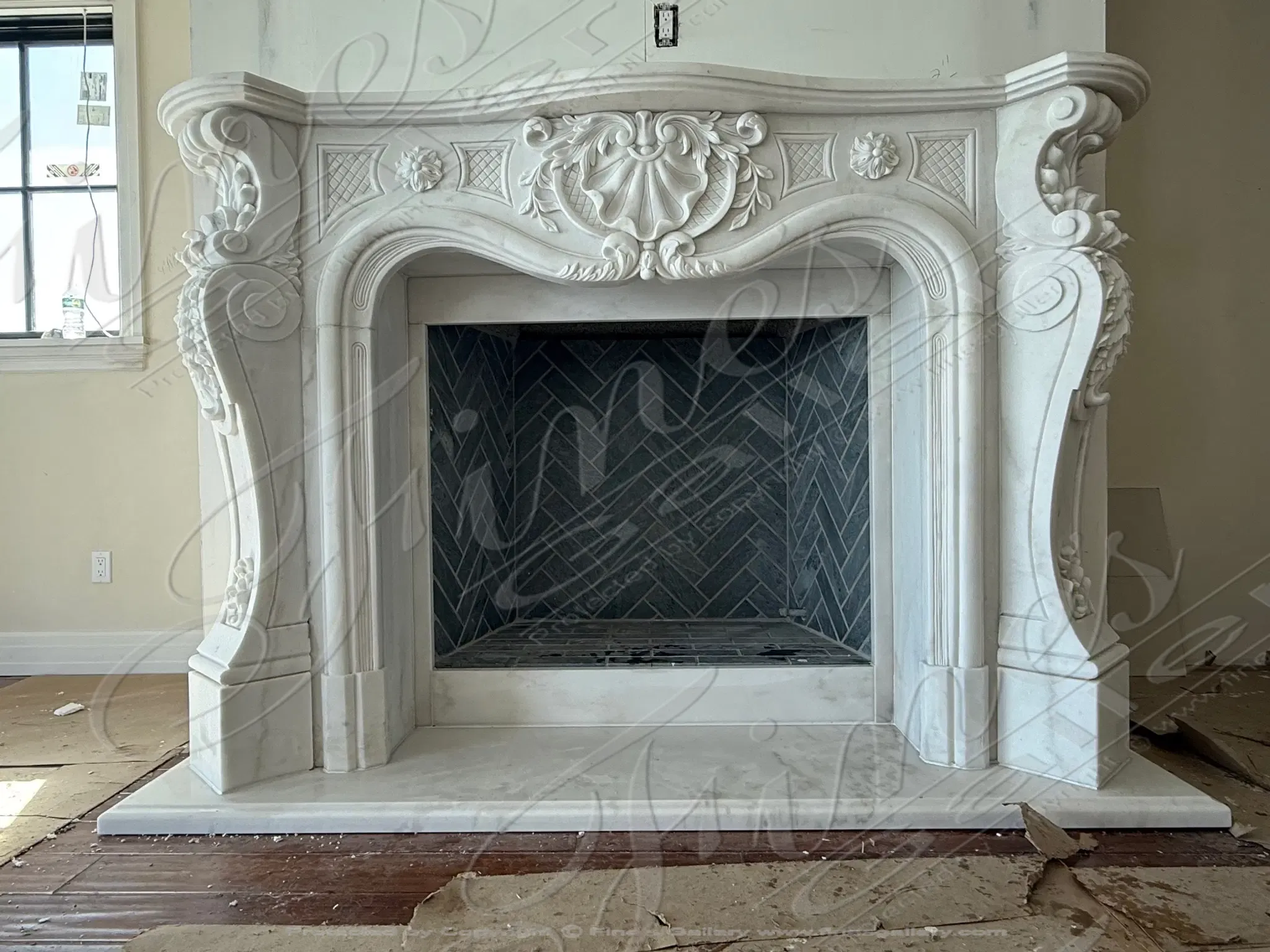 Ornate french marble mantel installation