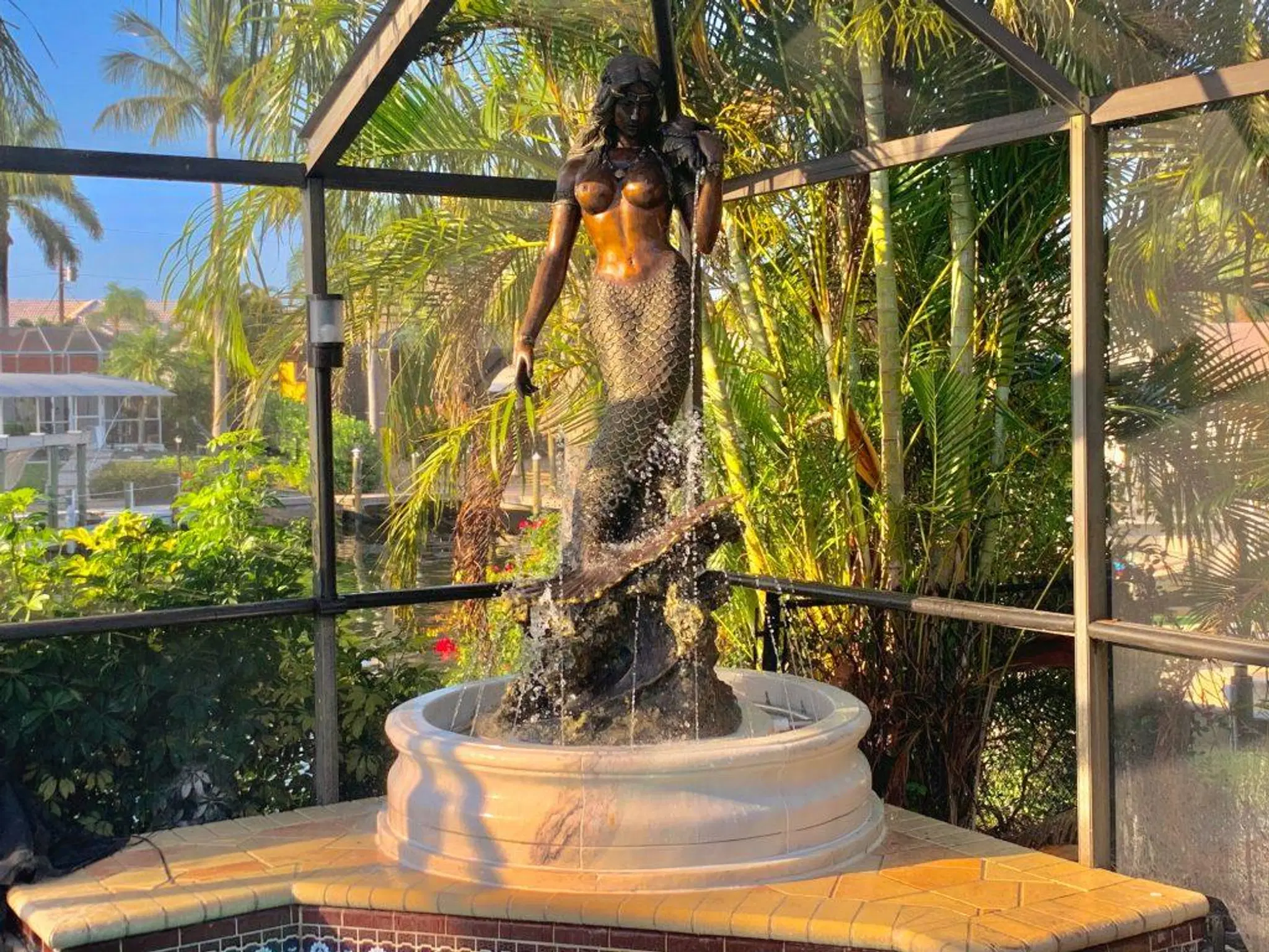 Over sized Bronze Mermaid in Custom Marble Pool