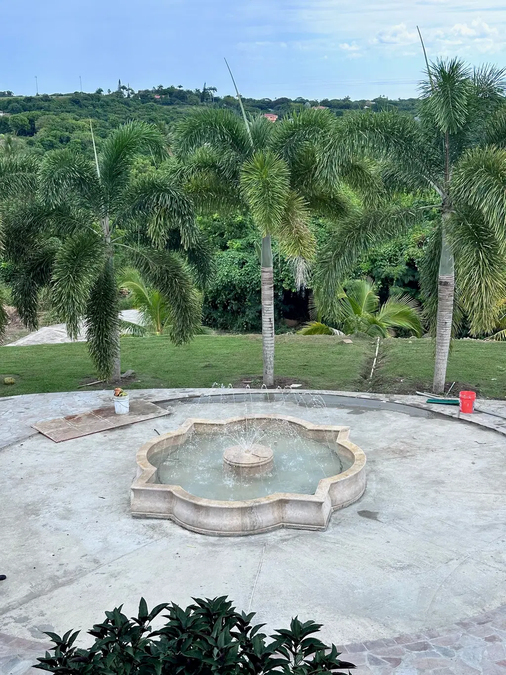 Quatrefoil Catch Basin Fountain Installation In the Carribean