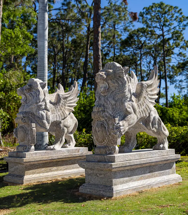 A pair of Winged Lions in Solid Granite