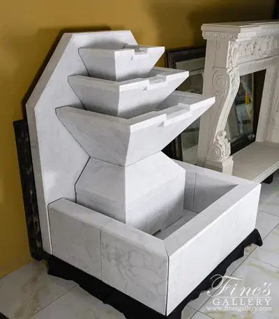Clean Coastal Wall Fountain in White Marble