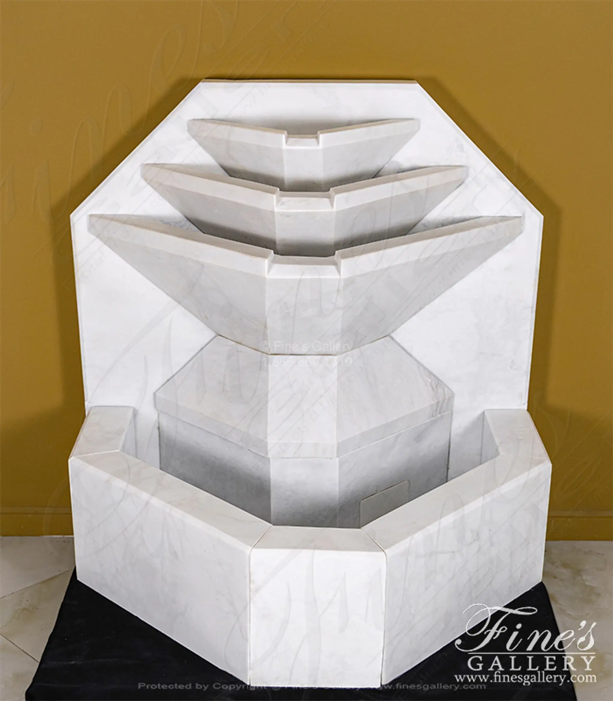 A Modern Wall Fountain In White Marble