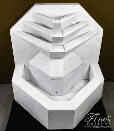 A Modern Wall Fountain In White Marble