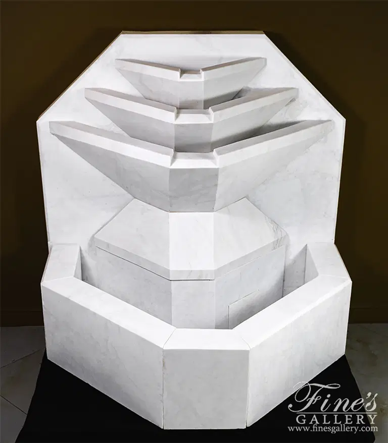 A Modern Wall Fountain In White Marble