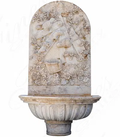Cherub, Floral and Vine Relief Style Wall Fountain in Miele Verona Limestone
