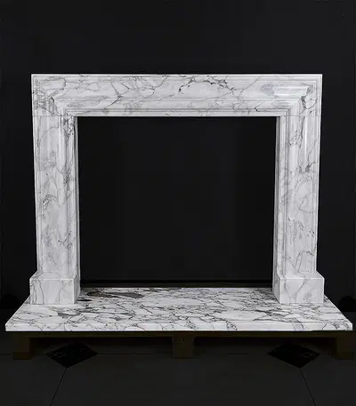 A Bolection Style Mantel in Arabascato Marble