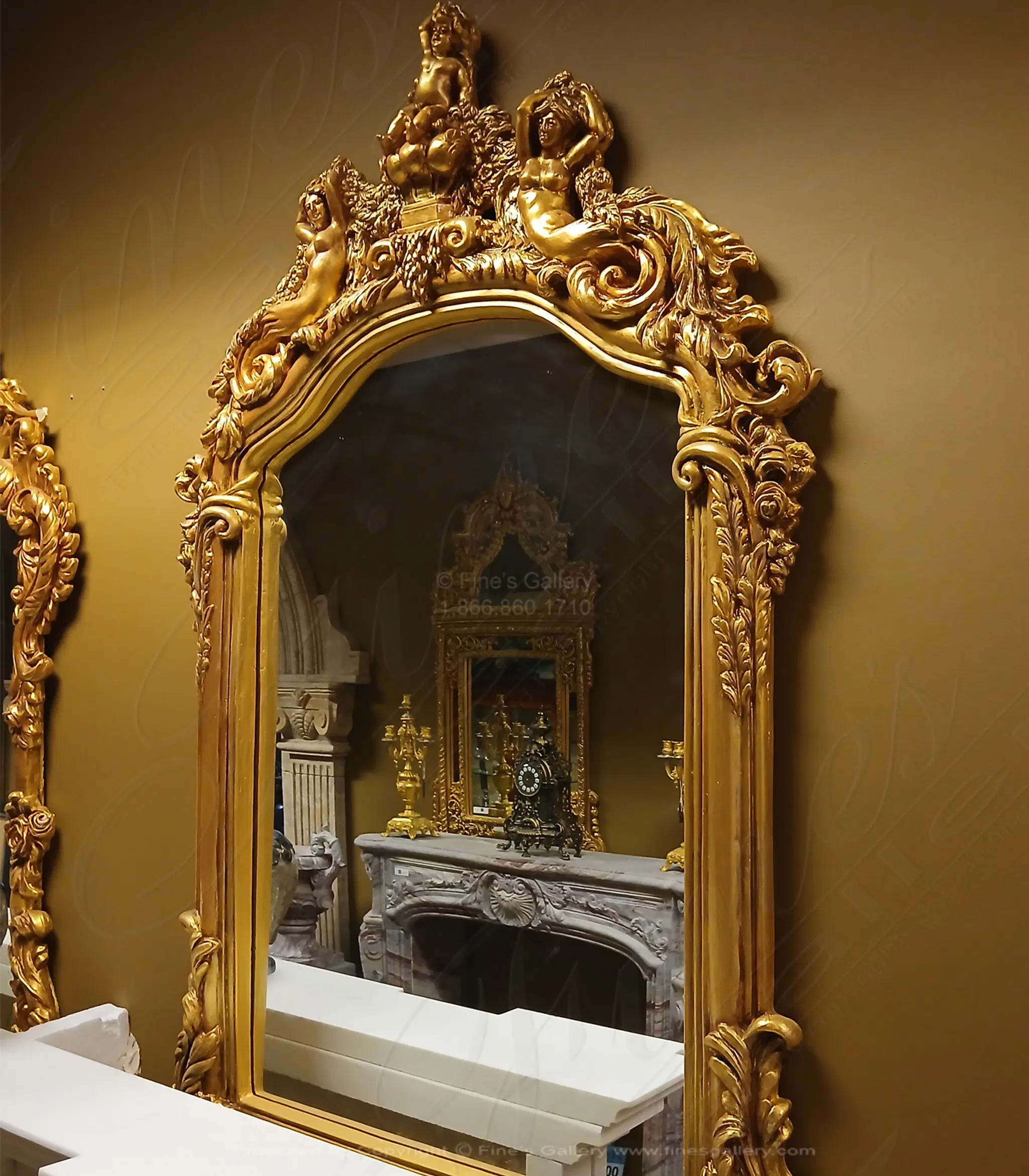 A stunning gold gild finished french style mirror 